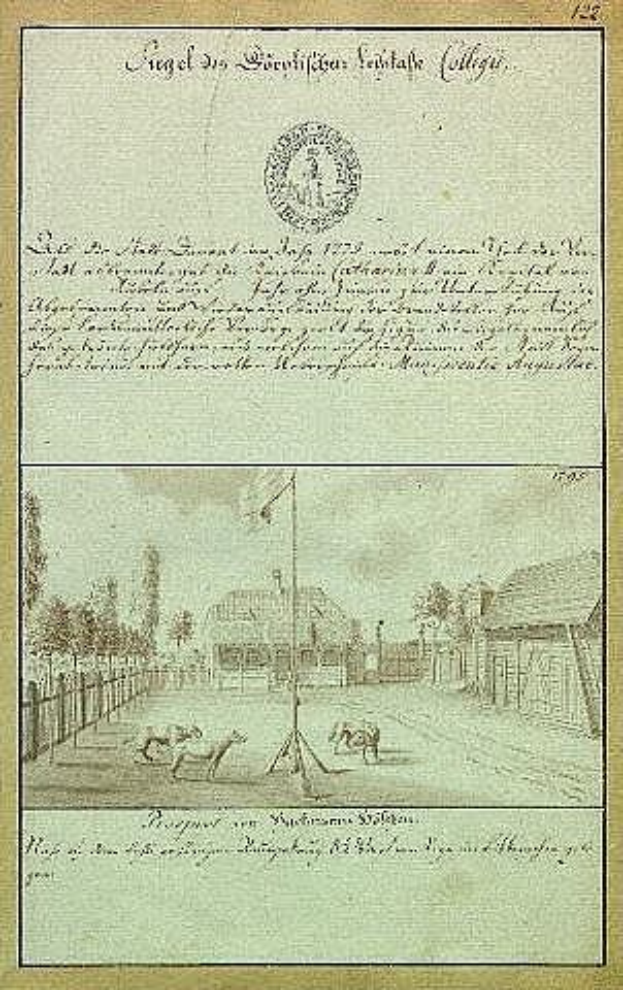 Schwarz-weißes Bild der ersten Fassung der deutschen Verfassung, das eine Straßenszene mit einem Fahnenmast, Gebäuden, Bäumen und Himmel zeigt.