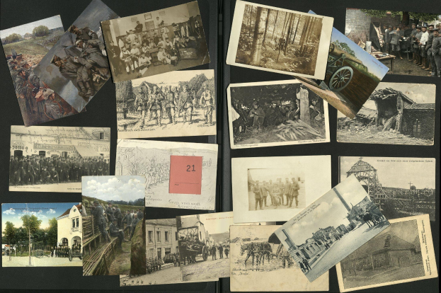 Eine Sammlung alter Ansichtskarten aus der deutschen Besetzung Deutschlands während des Ersten Weltkriegs, die auf einer schwarzen Oberfläche angeordnet sind und verschiedene Szenen einschließlich Menschen, Gebäuden, Bäumen, Fahrzeugen und dem Himmel zeigen.