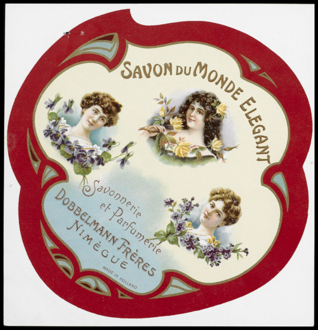 Plakat mit drei Frauen in eleganten Kleidern mit klassischem Hairstyling, umgeben von blühenden Blumen, mit der fetten Schrift 'Savon du Monde Elegant' oben.