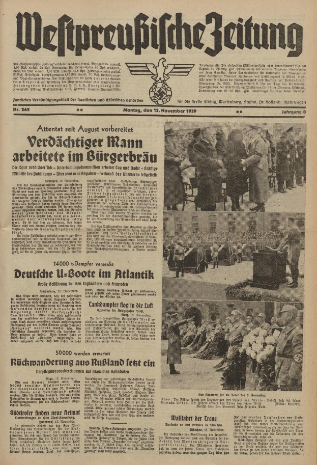 Schwarze Titelseite einer deutschen Zeitung vom 13. November 1939 mit der Schlagzeile 'Weitpreubliche Zeitung' und einem Foto von Menschen in traditioneller deutscher Tracht in einer feierlichen Atmosphäre.