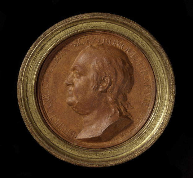 Bronze-Medaille mit goldenem Rahmen mit einem Porträt von Thomas Jefferson, beschriftet mit Gedenktext.