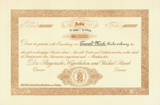 Altes Wertpapier mit goldenem Rand, das ein Porträt eines Mannes und Text enthält, der darauf hinweist, dass es eine Anleihe ist.